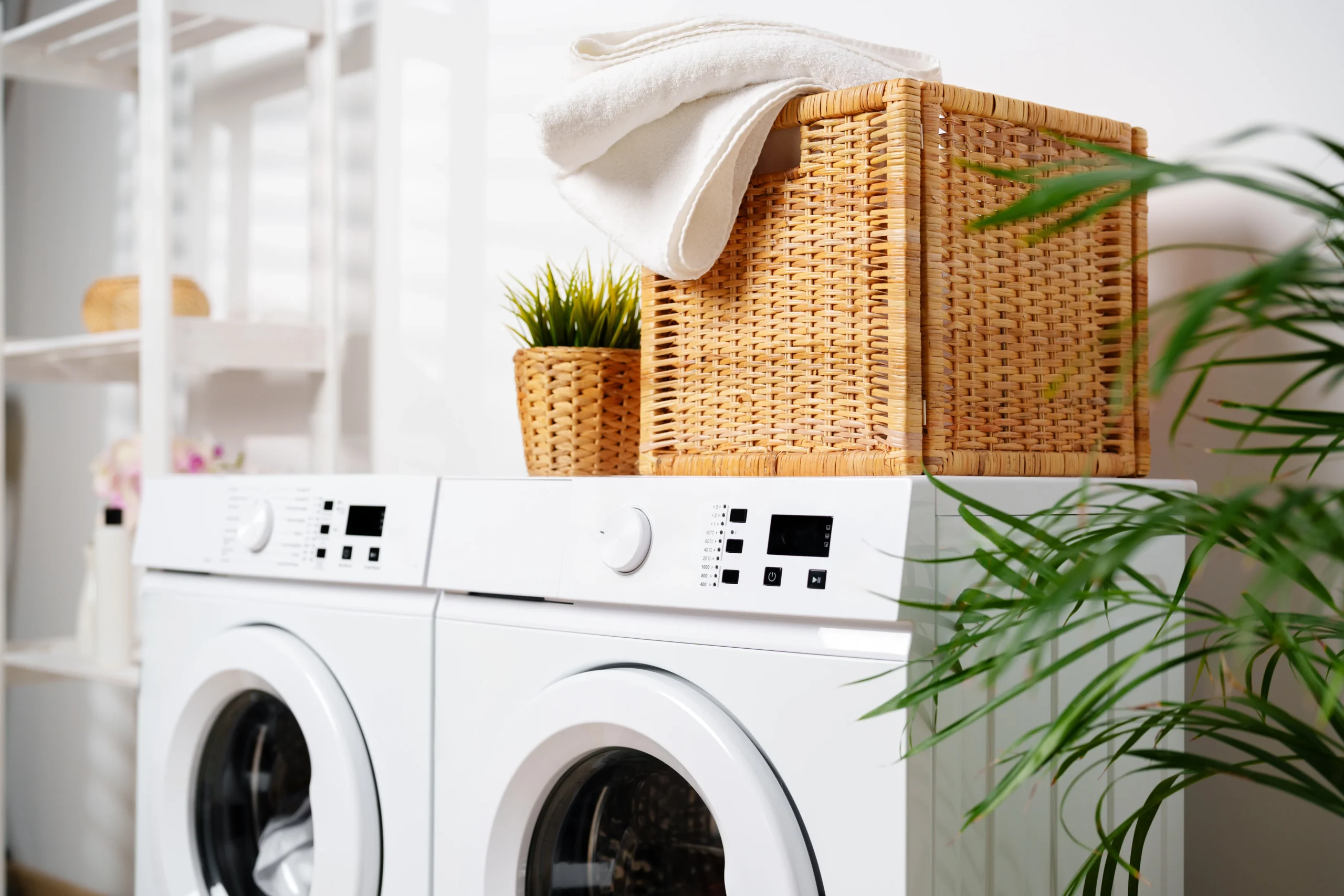 230462550_l (1) White Towels In Wicker Basket On Top Of White Washing Machine